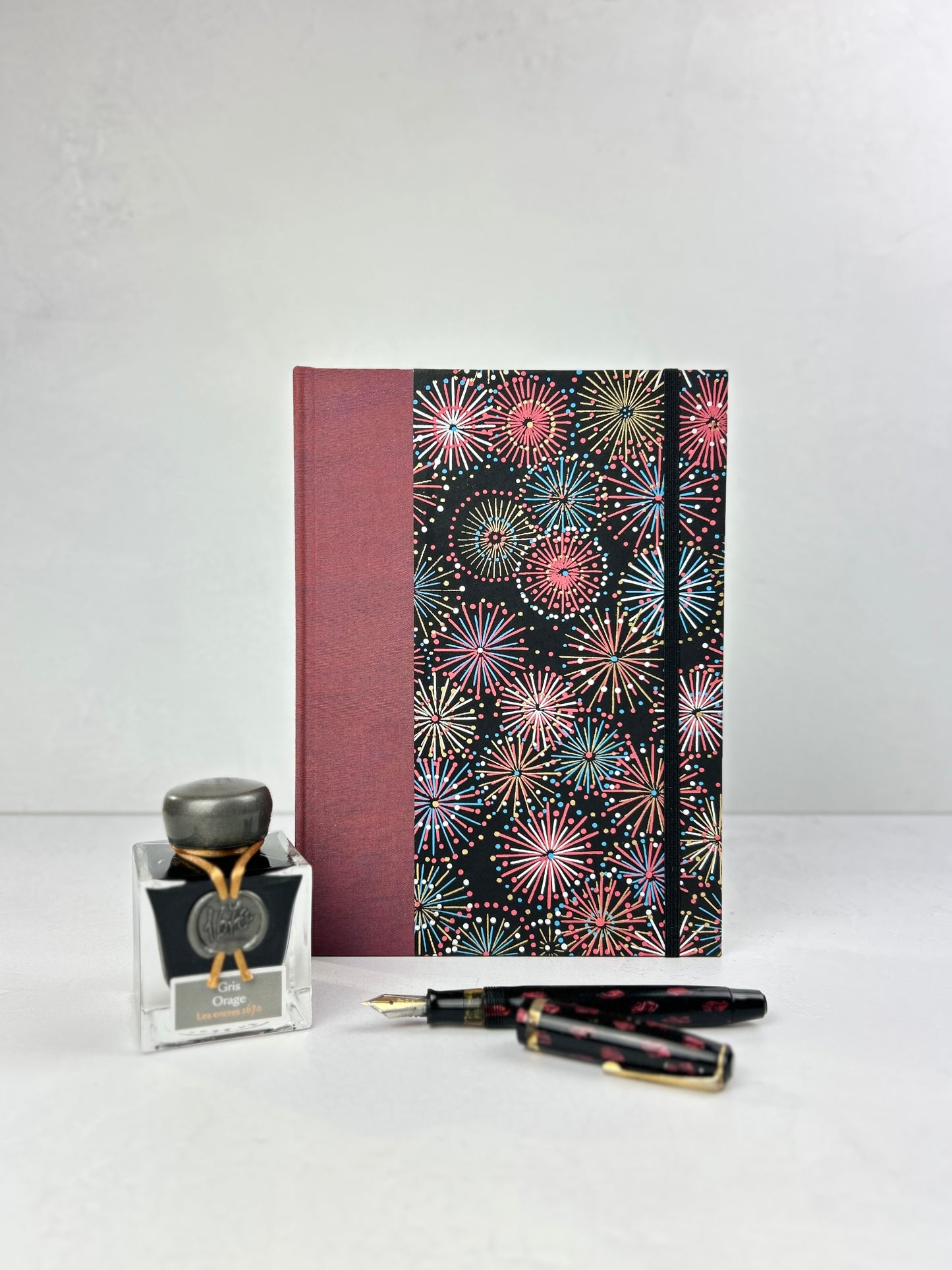 (JANUARY 2026 DELIVERY) A5 Hardcover Notebook finished in Rust Blue Japanese book cloth and Chiyogami Fireworks on Black