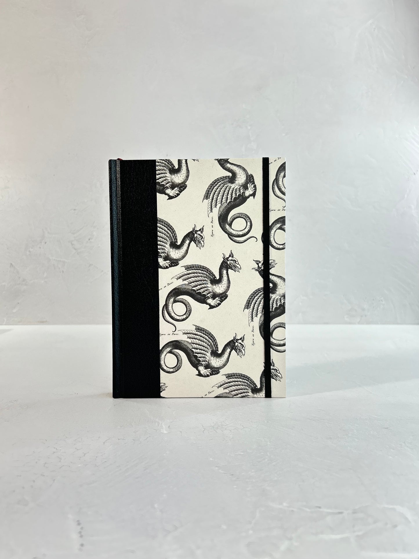 A5 160-page Hardcover Journal finished in Black Vaux Leather and Italian Letterpress dragon design