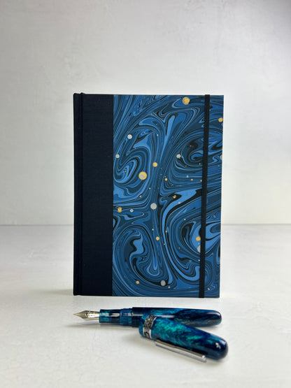 A5 160-page Hardcover Journal finished in Black Japanese book cloth and Renato Crepaldi hand marbled decorative paper