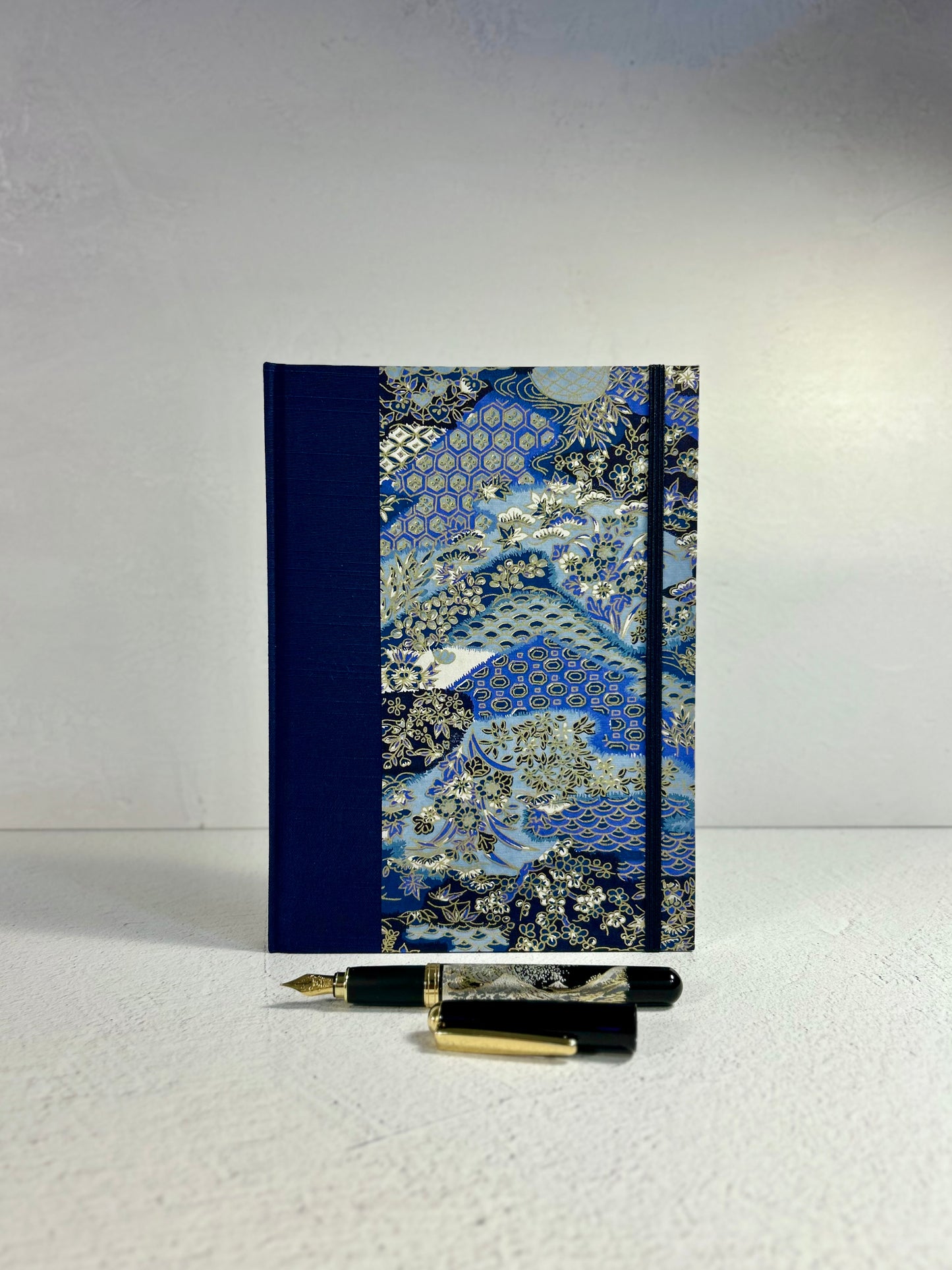 A5 Hardcover Notebook finished in Cadet Blue Japanese book cloth and vintage blue and purple Chiyogami decorative paper