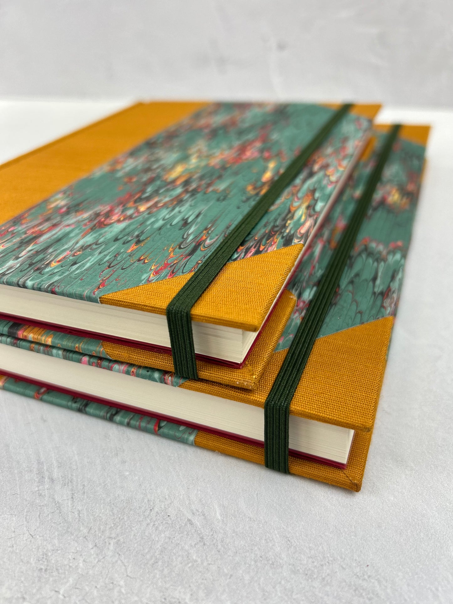 B5 192-page Hardcover Journal finished in Ochre Japanese book cloth and green French Marble Paper