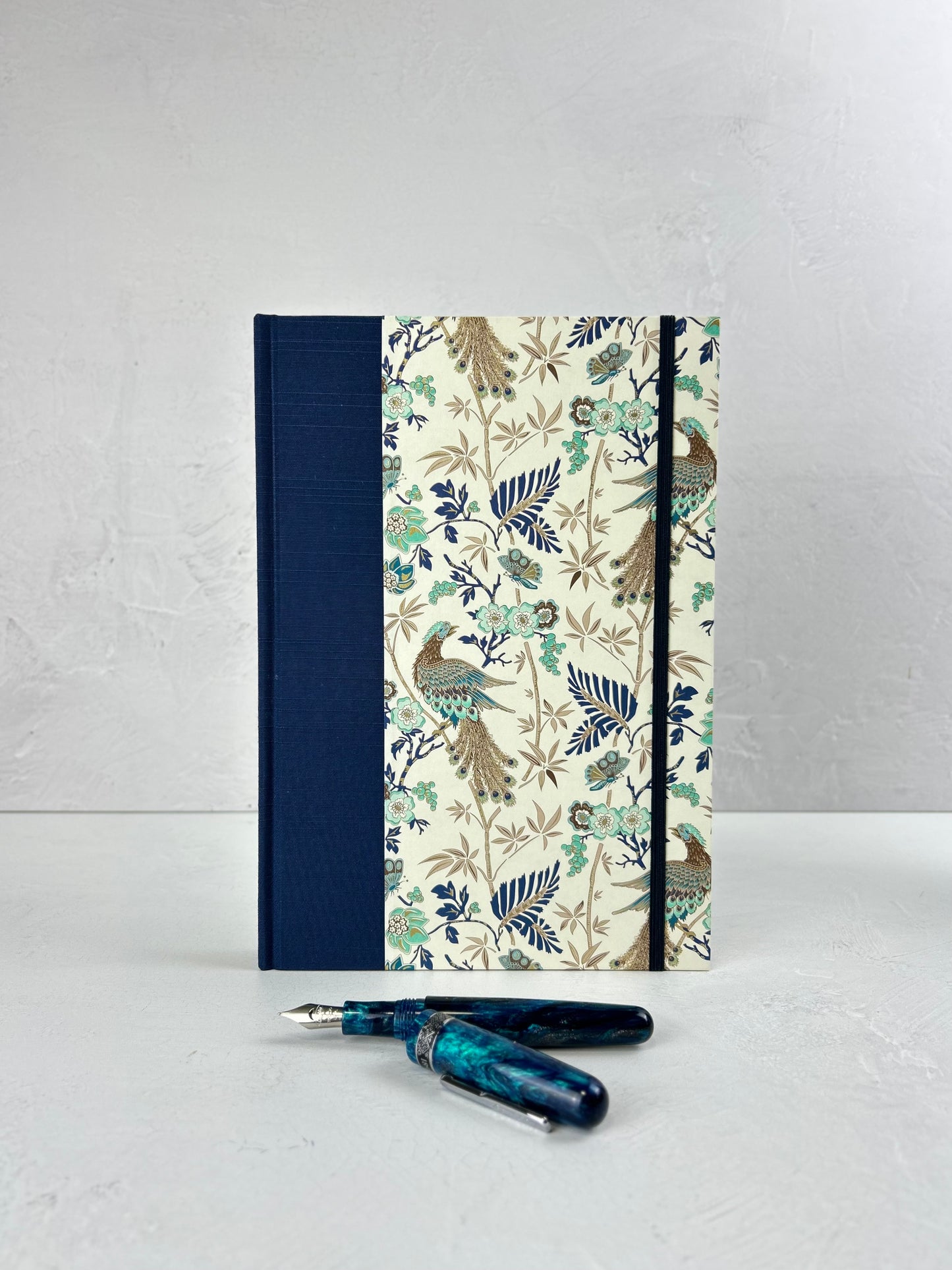 B5 Hardcover Notebook finished in Cadette Blue Japanese book cloth and Gold Peacock Italian Print