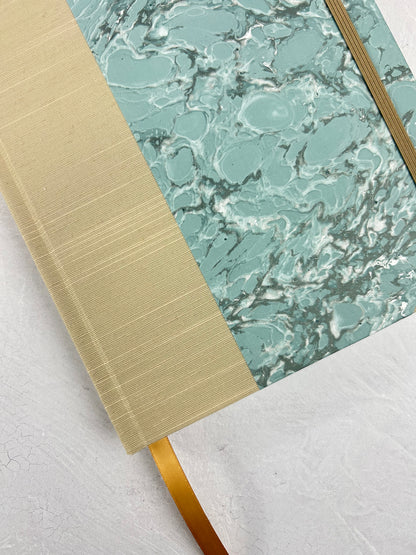 A5 160-page Hardcover Journal finished in Platinum Japanese book cloth and light blue French Marble Paper