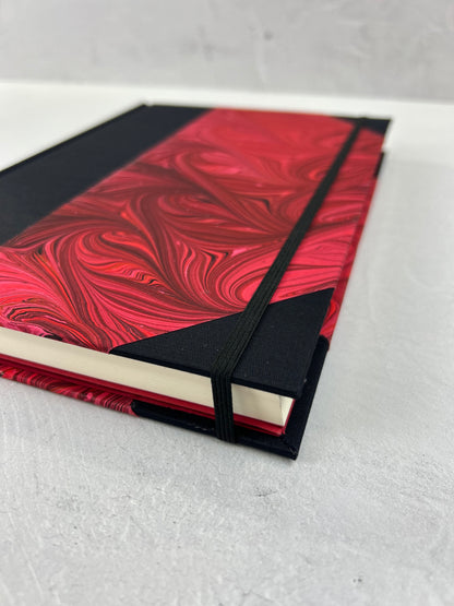 B5 192-page Hardcover Journal finished in Black Japanese book cloth and red hand marbled paper by Daniel Gaál