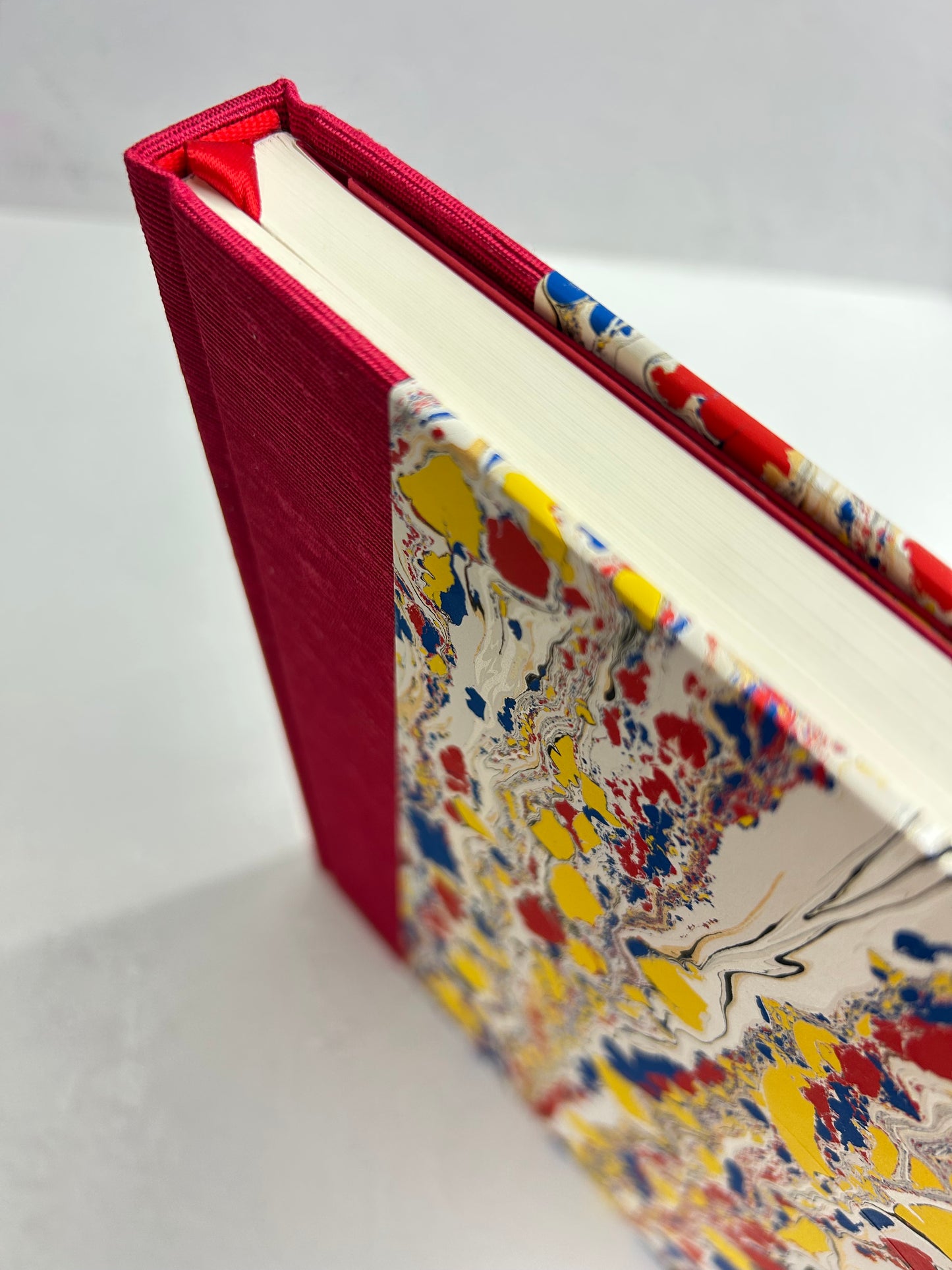 B5 192-page Hardcover Journal finished in Cardinal Red Japanese book cloth and Italian hand-marbled paper by Renato Crepaldi