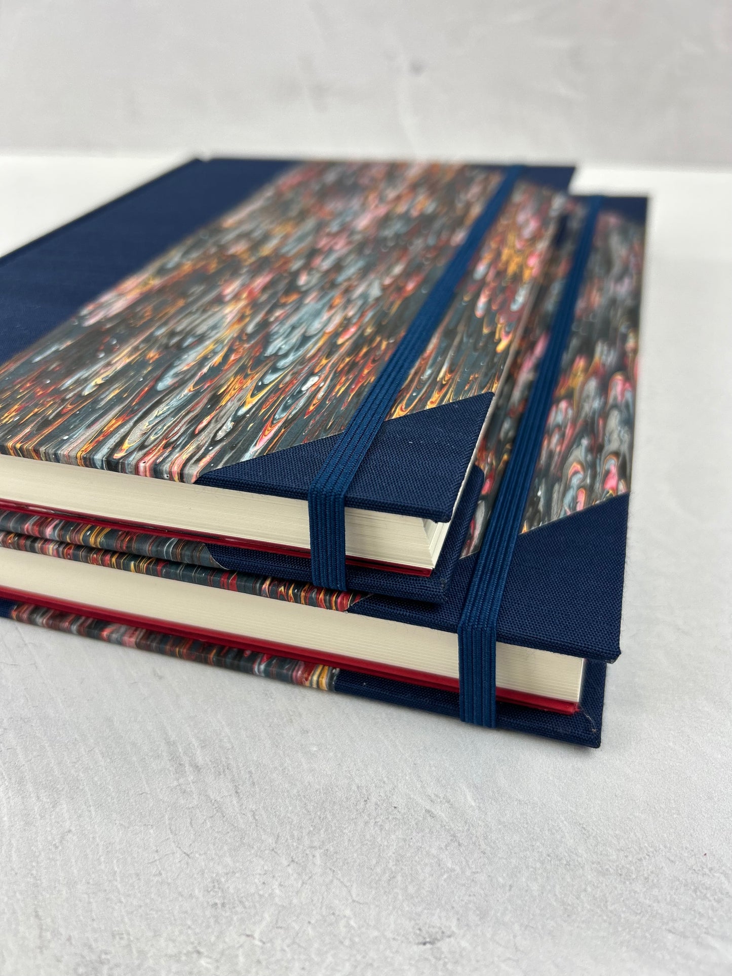A5 160-page Hardcover Journal finished in Cadette Blue Japanese book cloth and French Marbled Paper