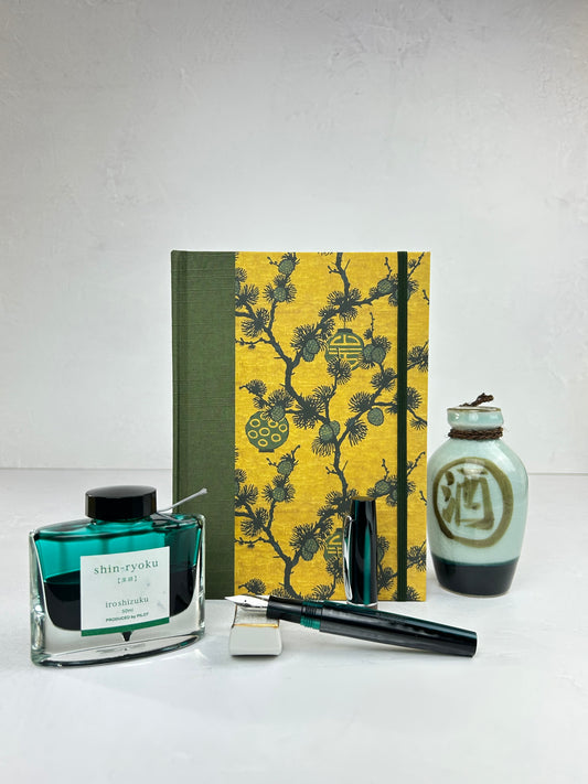 NEW A5 160-page Hardcover Journal finished in olive Japanese book cloth and ochre Pine branches and lanterns