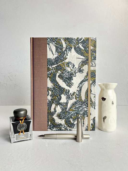WABI-SABI B5 192-page Hardcover Journal finished in Bronze Japanese book cloth and Dragon Chiyogami Paper