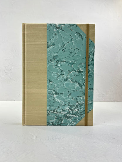 B5 192-page Hardcover Journal in finished in Platinum Japanese book cloth and light blue French Marble Paper