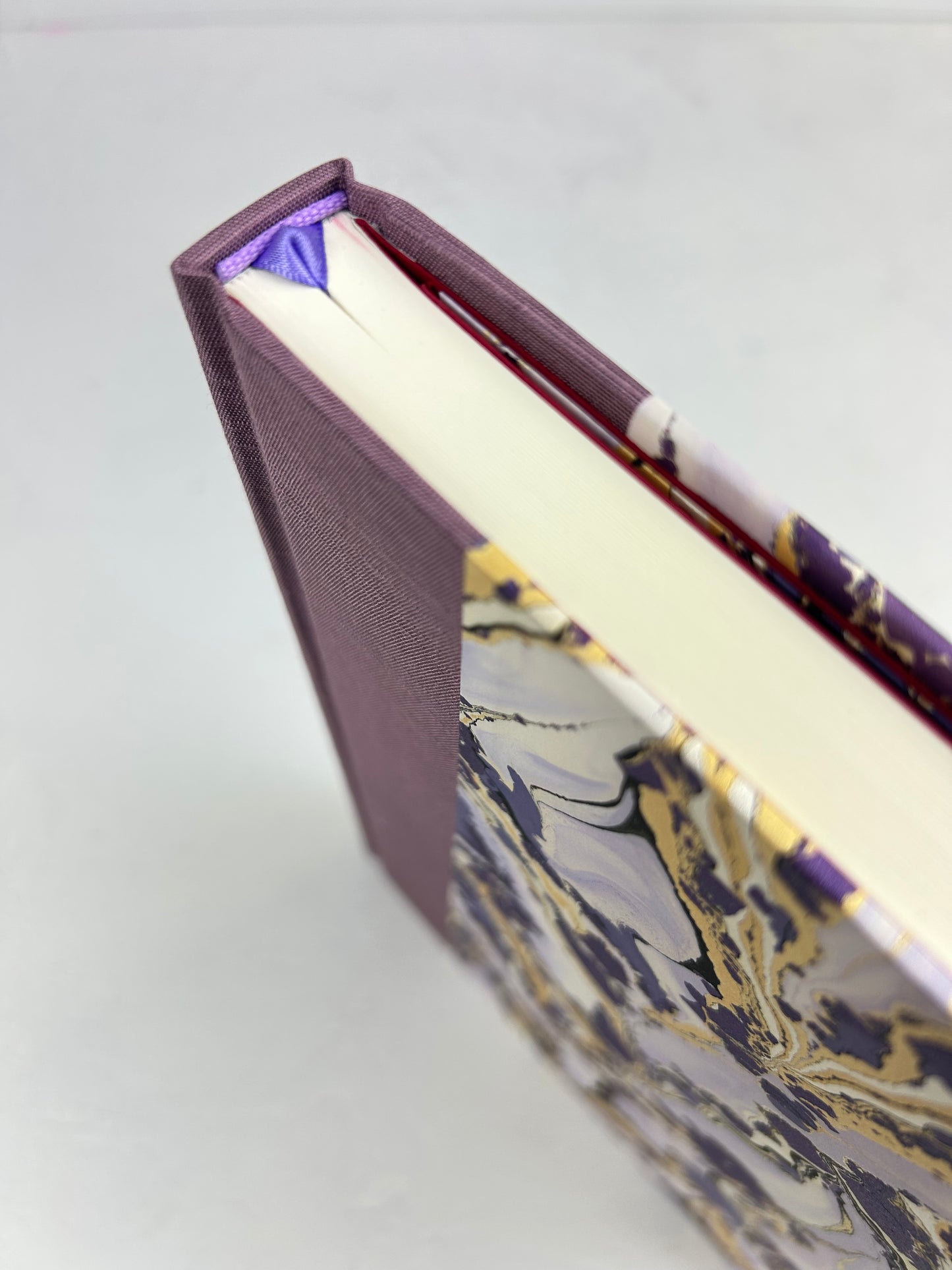 B5 192-page Hardcover Journal finished in plum Japanese book cloth and hand marbled paper by Renato Crepaldi