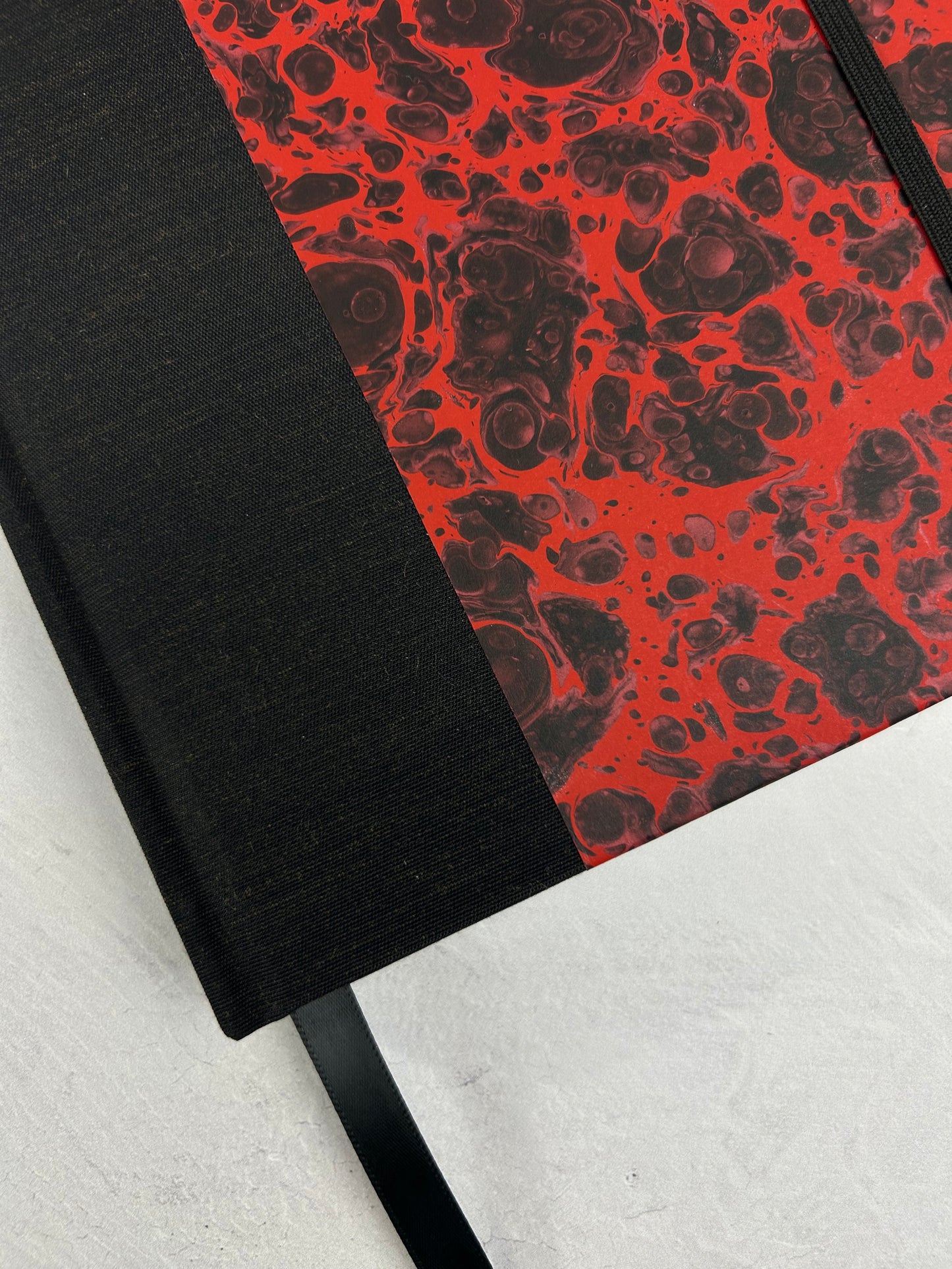 A5 160-page Hardcover Journal finished in Black Mohair Japanese book cloth and hand marbled paper by Daniel Gaál