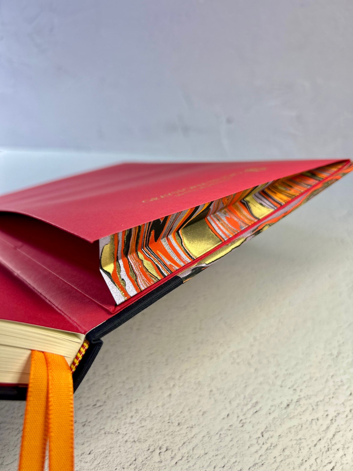 A5 Hardcover Notebook finished in Black Japanese book cloth and Renato Crepaldi hand marbled paper
