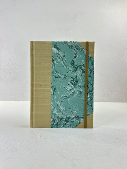A5 160-page Hardcover Journal finished in Platinum Japanese book cloth and light blue French Marble Paper