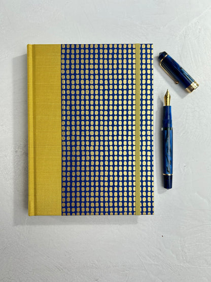 A5 160-page Hardcover Journal finished in Yellow Gold Japanese book cloth and blue and gold Chiyogami Paper