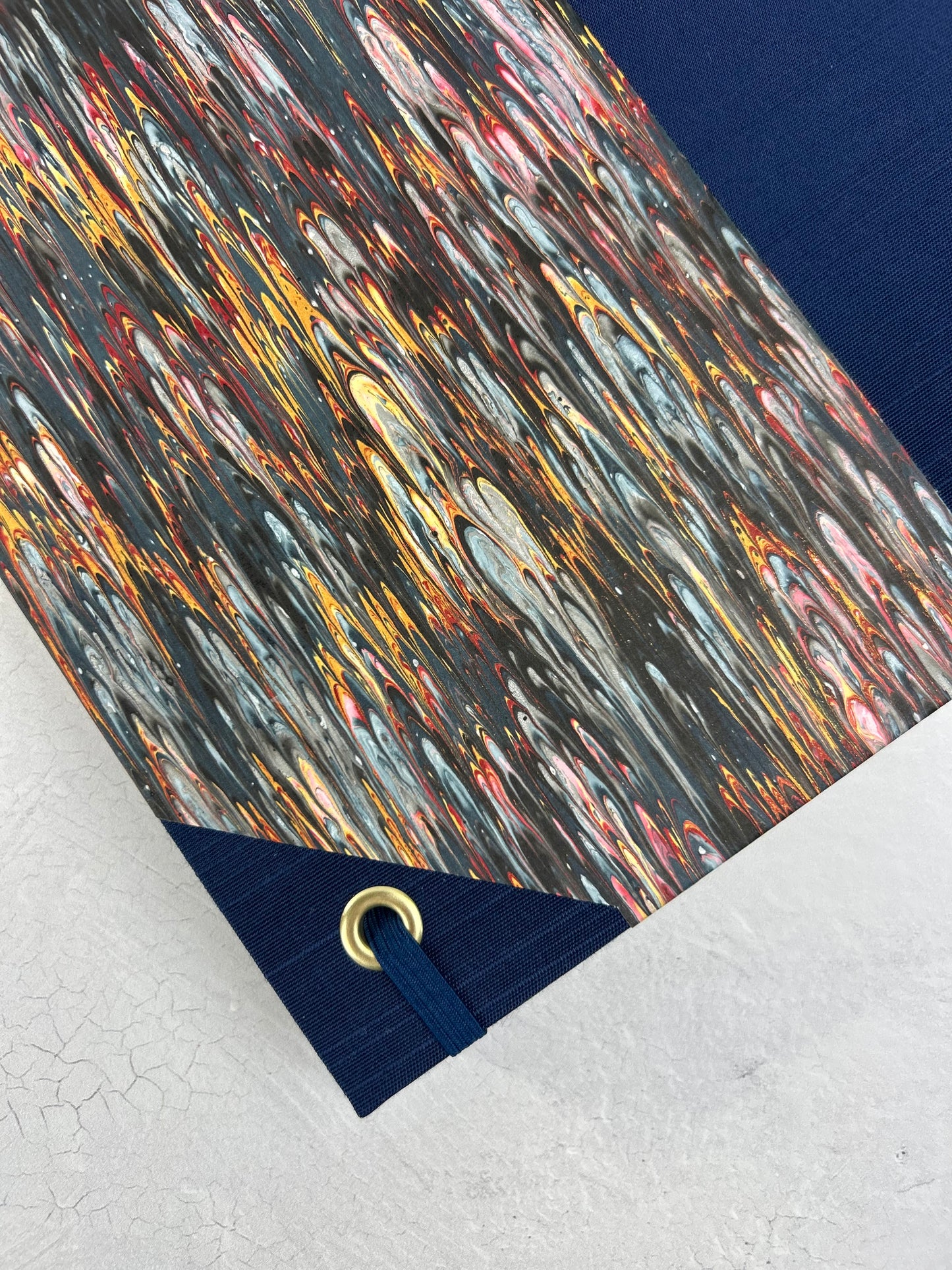 A5 160-page Hardcover Journal finished in Cadette Blue Japanese book cloth and French Marbled Paper
