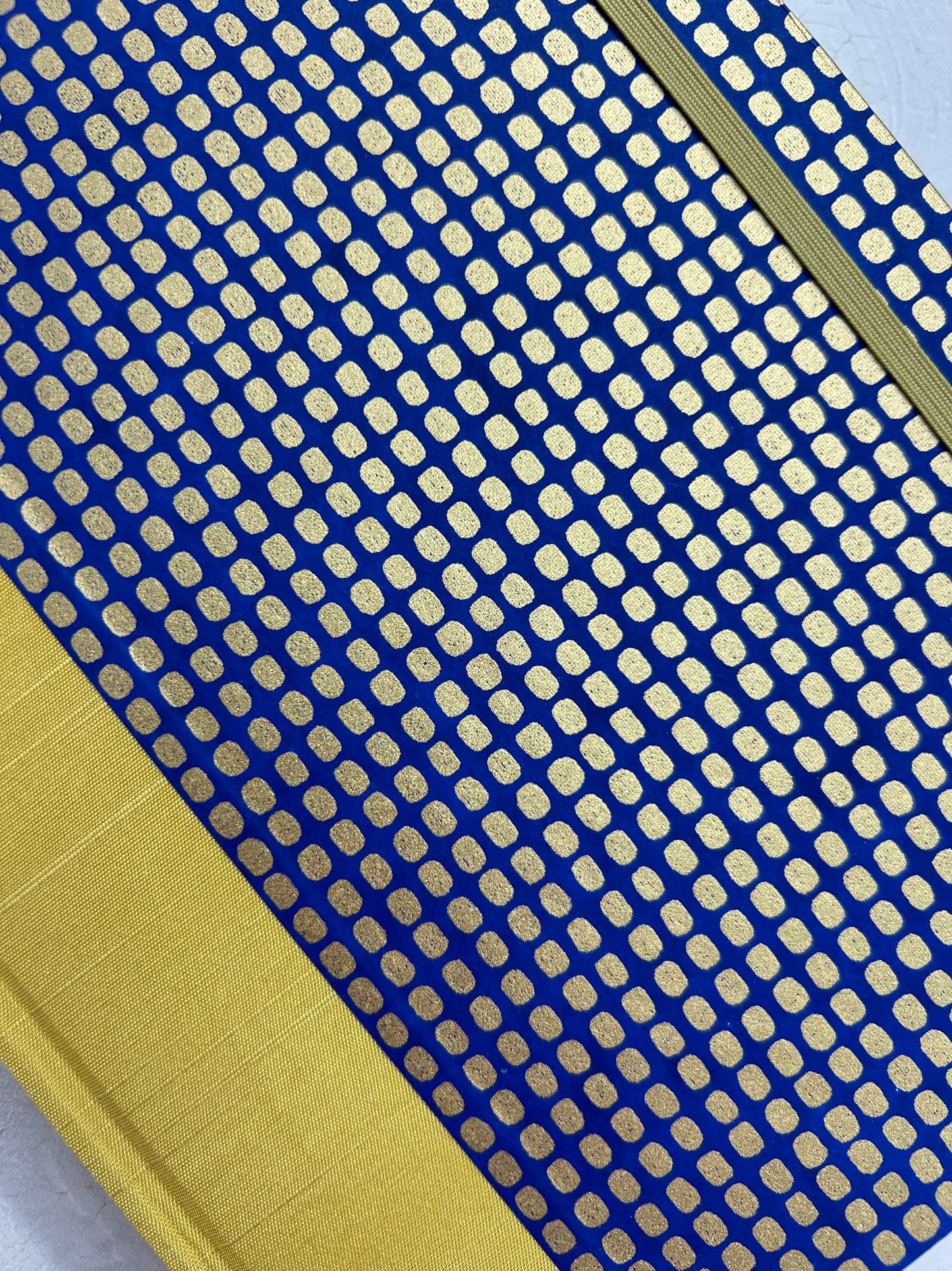 A5 160-page Hardcover Journal finished in Yellow Gold Japanese book cloth and blue and gold Chiyogami Paper