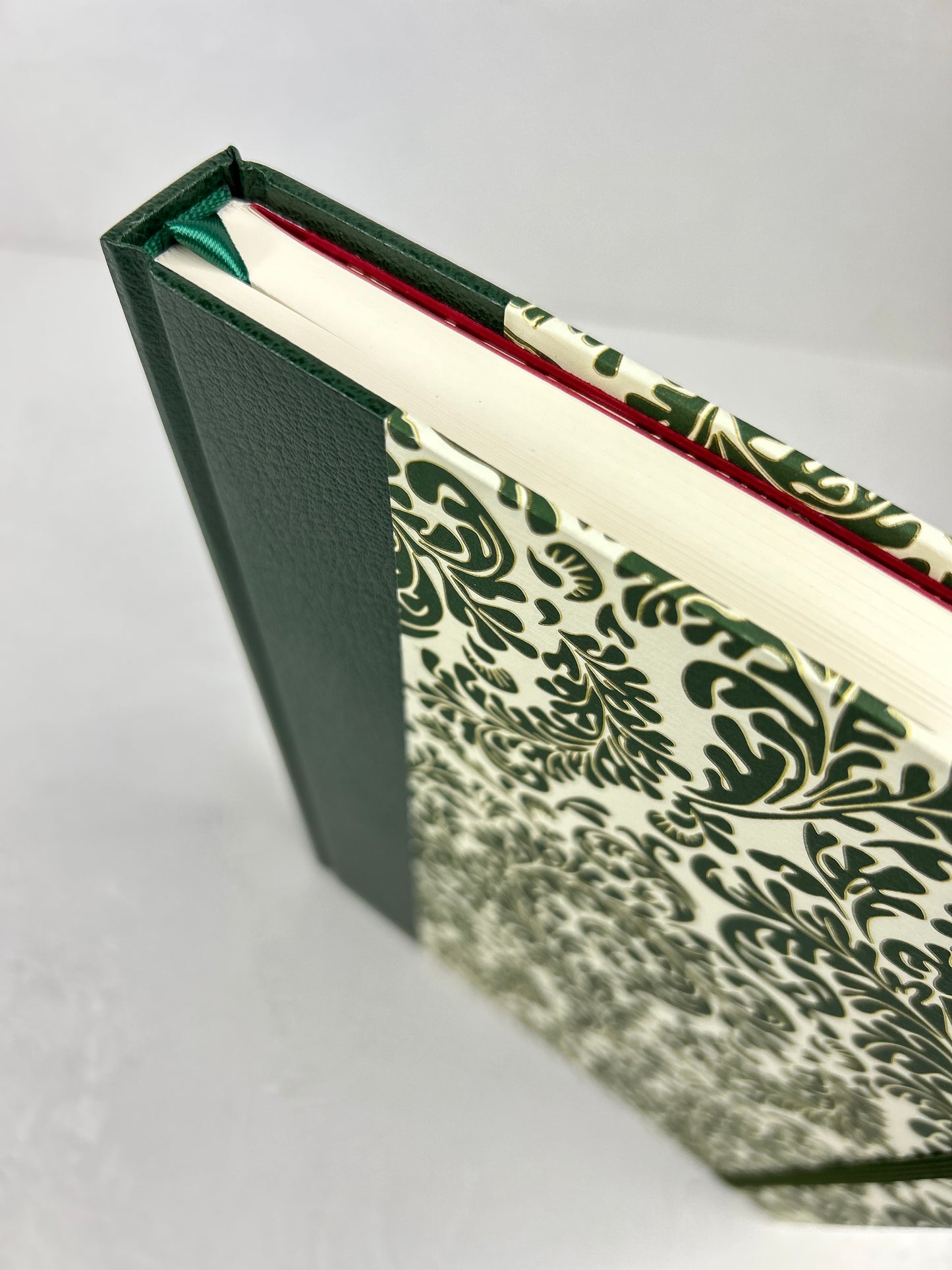 A5 160-page Hardcover Journal finished in Green Vaux Leather and green and gold fern Italian Florentine print