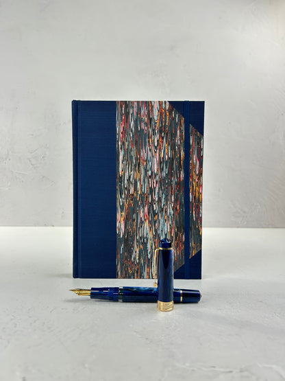 A5 160-page Hardcover Journal finished in Cadette Blue Japanese book cloth and French Marbled Paper