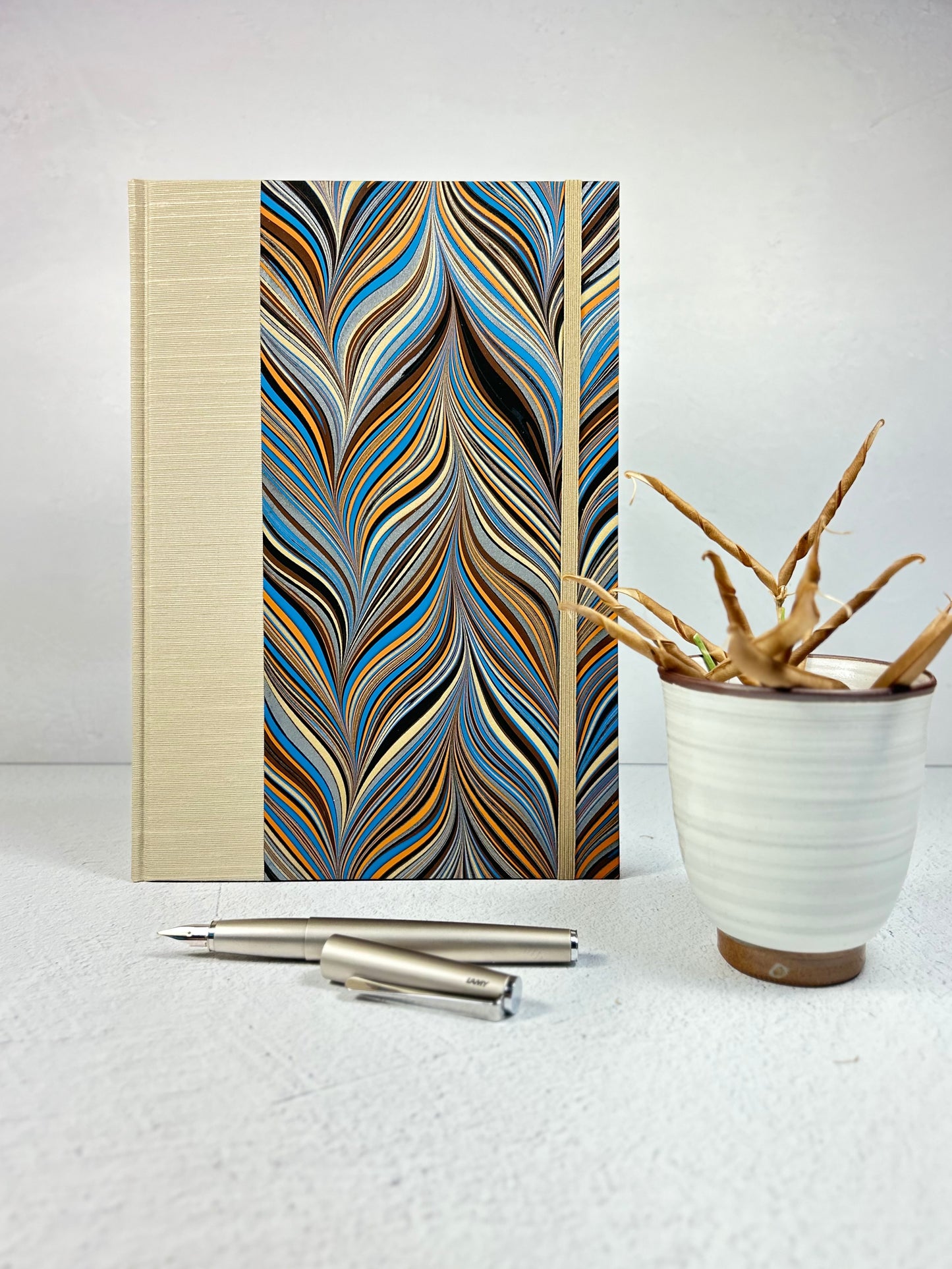 B5 Hardcover Notebook finished in Platinum Japanese book cloth and featuring Renato Crepaldi hand-marbled decorative paper
