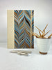 B5 Hardcover Notebook finished in Platinum Japanese book cloth and featuring Renato Crepaldi hand-marbled decorative paper