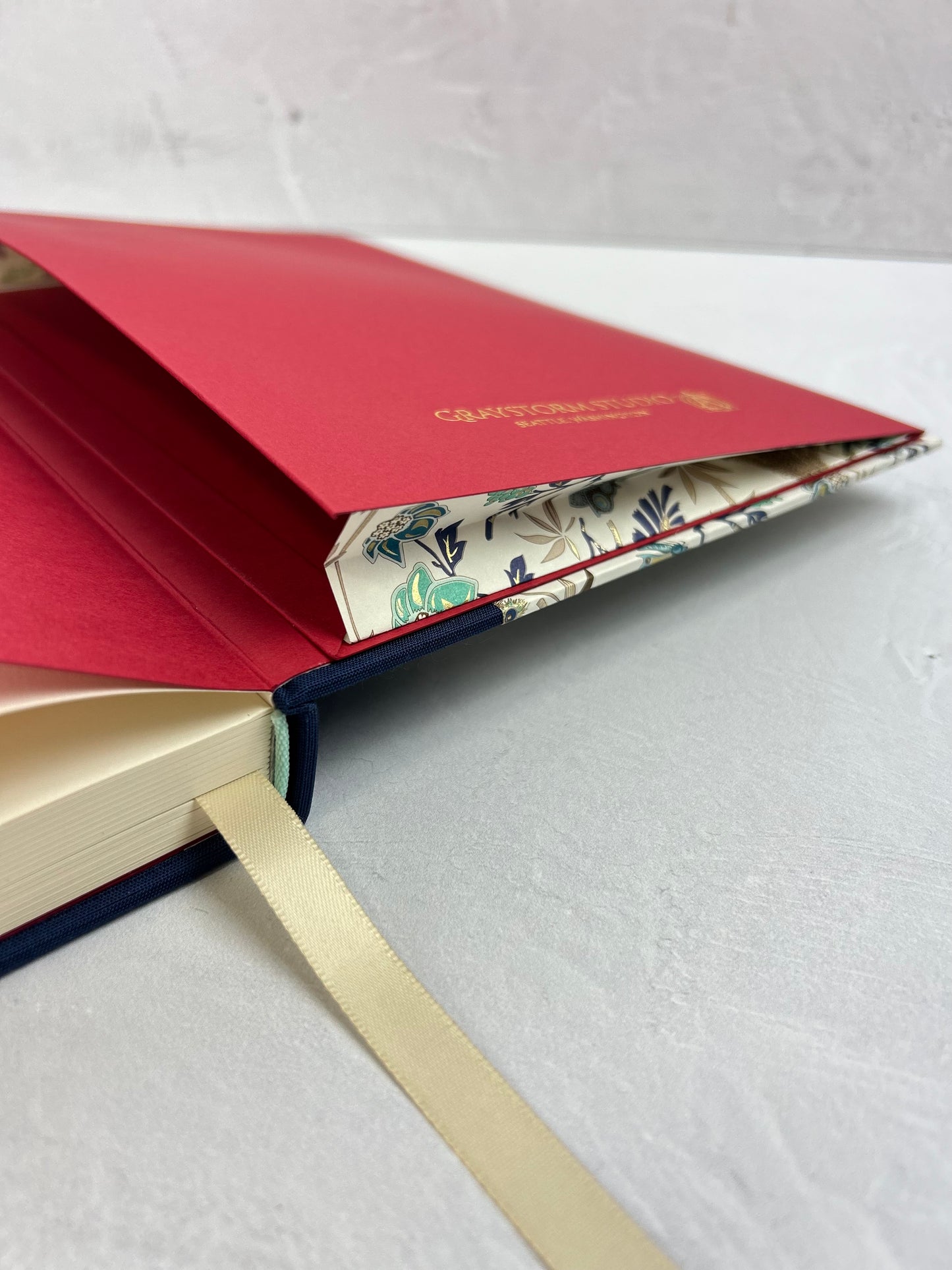 B5 Hardcover Notebook finished in Cadette Blue Japanese book cloth and Gold Peacock Italian Print
