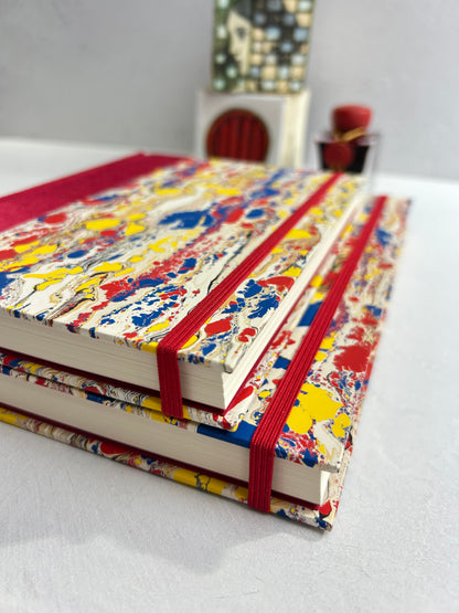 B5 192-page Hardcover Journal finished in Cardinal Red Japanese book cloth and Italian hand-marbled paper by Renato Crepaldi