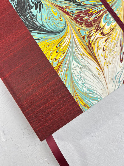 B5 192-page Hardcover Journal finished in Dark Red Japanese book cloth and hand marbled paper by Daniel Gaál