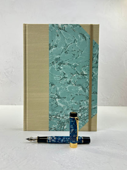 B5 192-page Hardcover Journal in finished in Platinum Japanese book cloth and light blue French Marble Paper