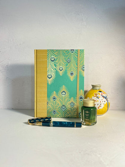 A5 Hardcover Notebook finished in Yellow Gold Japanese Book cloth and Matthew Williamson Peacock print