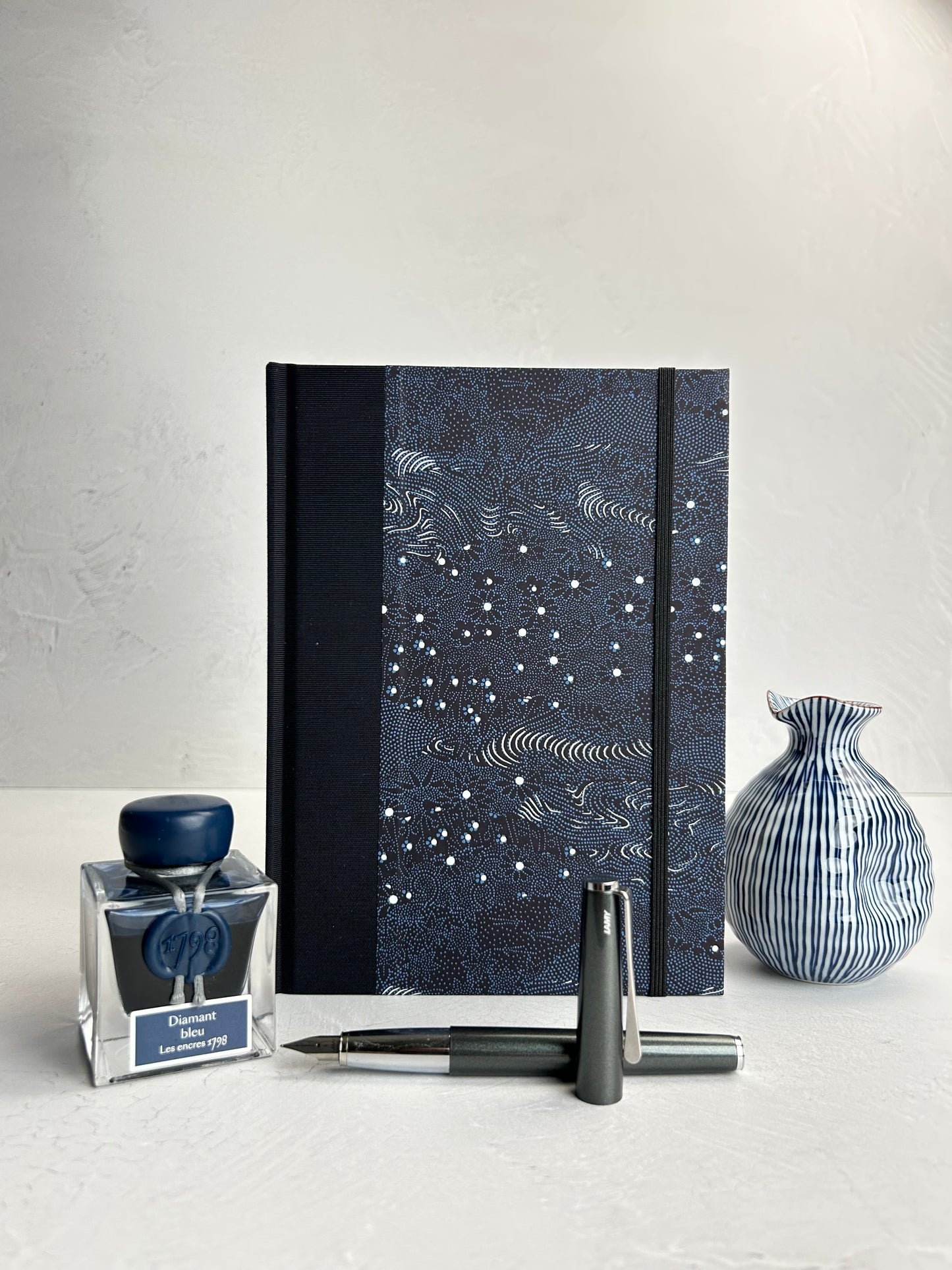 A5 160-page Hardcover Journal in finished Black Japanese book cloth and dark blue Chiyogami Paper