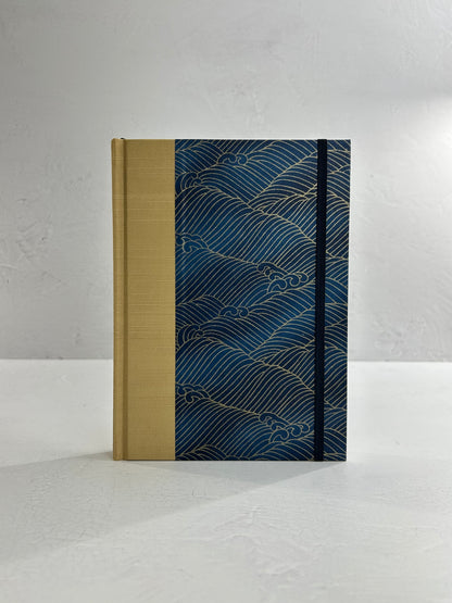 A5 160-page Hardcover Journal finished in soft gold Japanese book cloth and golden waves on blue Chiyogami Paper