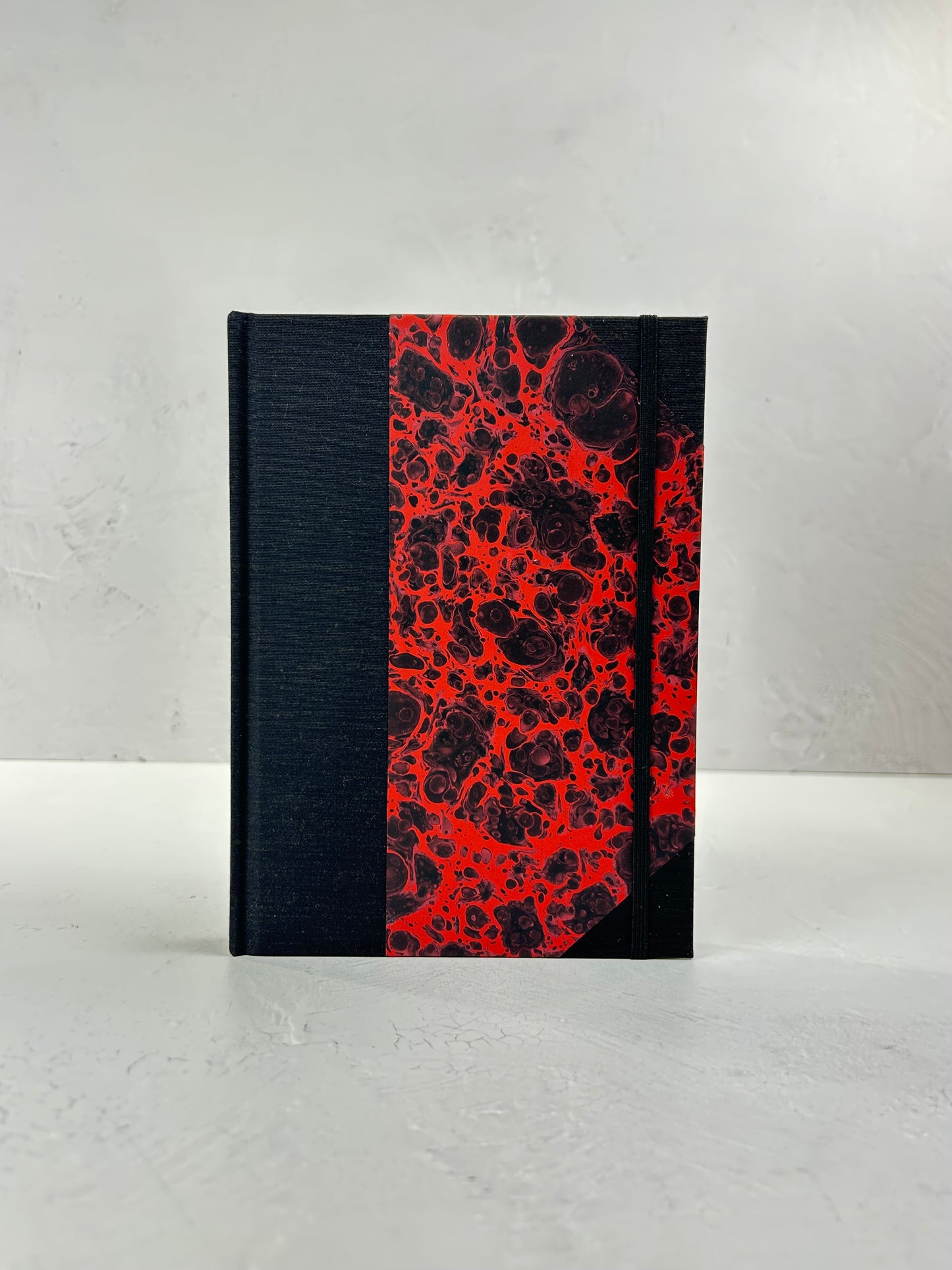 A5 160-page Hardcover Journal finished in Black Mohair Japanese book cloth and hand marbled paper by Daniel Gaál