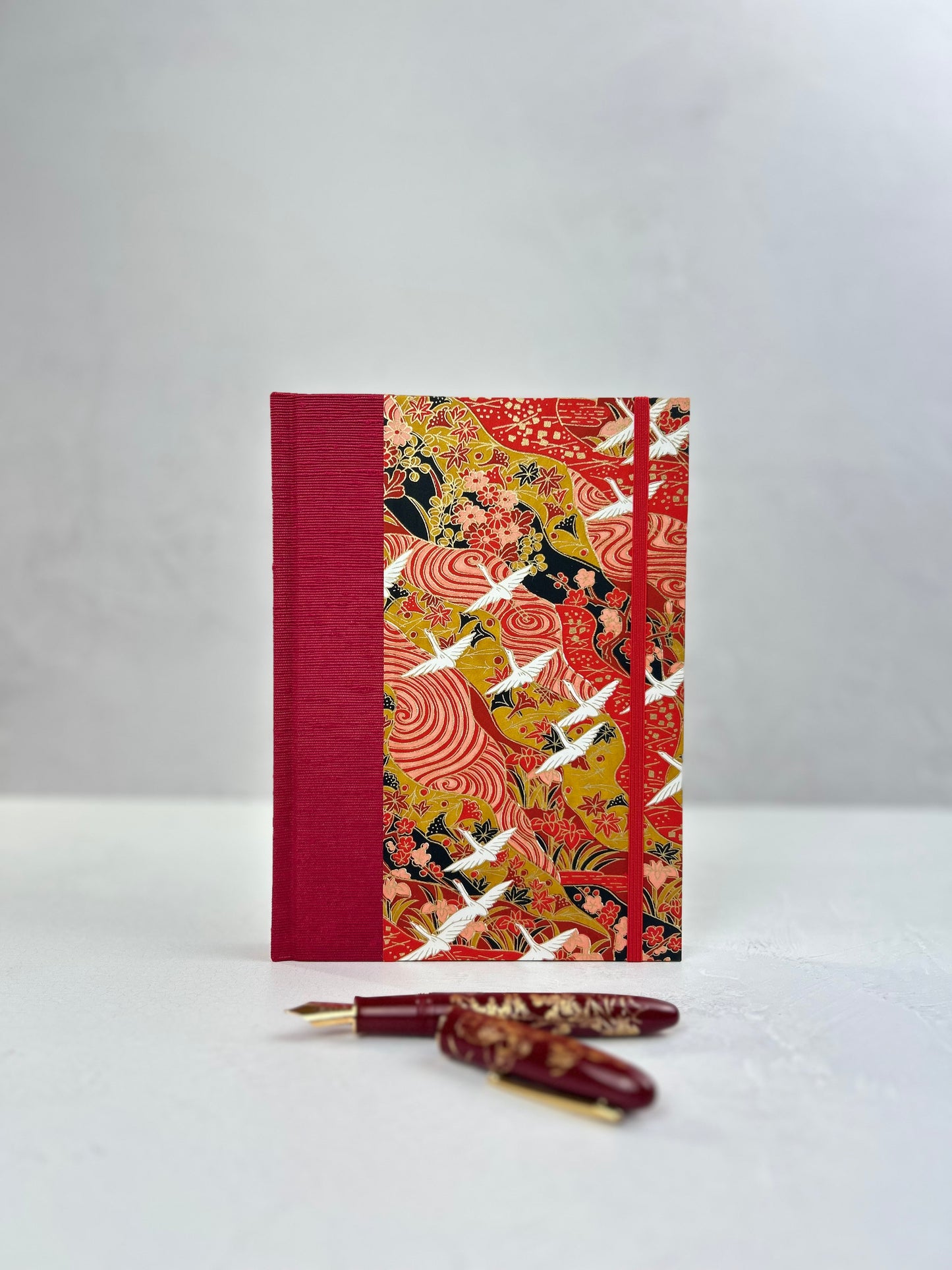 A5 Hardcover Notebook finished in Cardinal Red Japanese book cloth and White Cranes on Red Chiyogami Paper