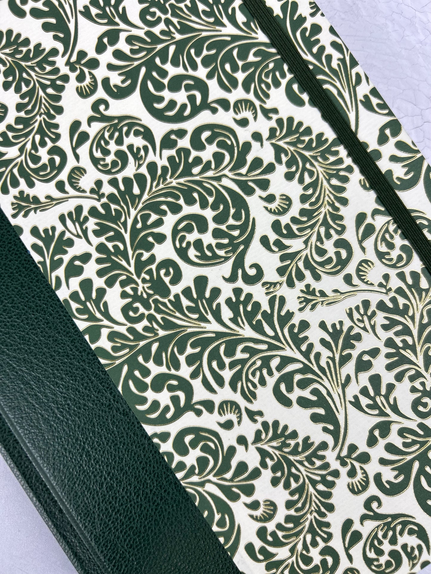 A5 160-page Hardcover Journal finished in Green Vaux Leather and green and gold fern Italian Florentine print