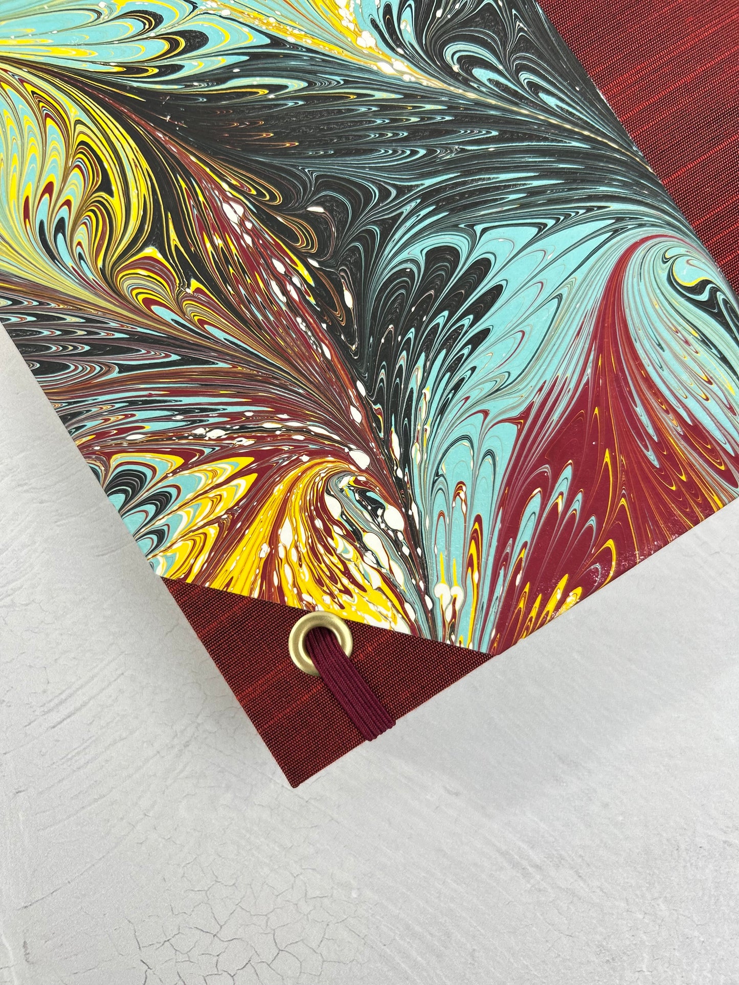 B5 192-page Hardcover Journal finished in Dark Red Japanese book cloth and hand marbled paper by Daniel Gaál