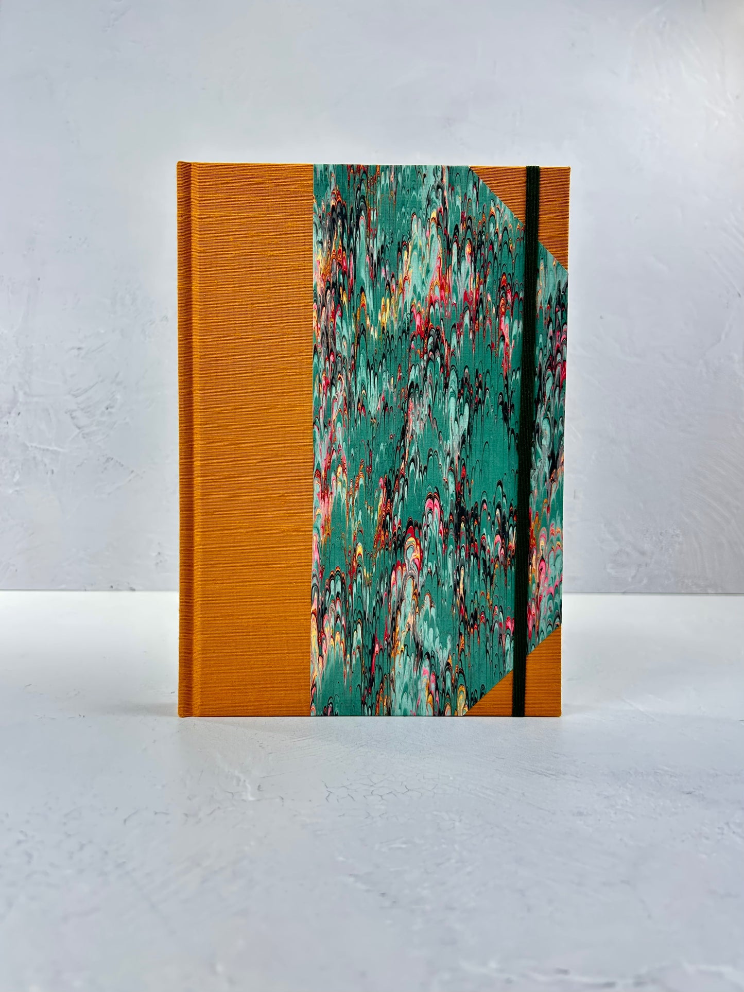 B5 192-page Hardcover Journal finished in Ochre Japanese book cloth and green French Marble Paper