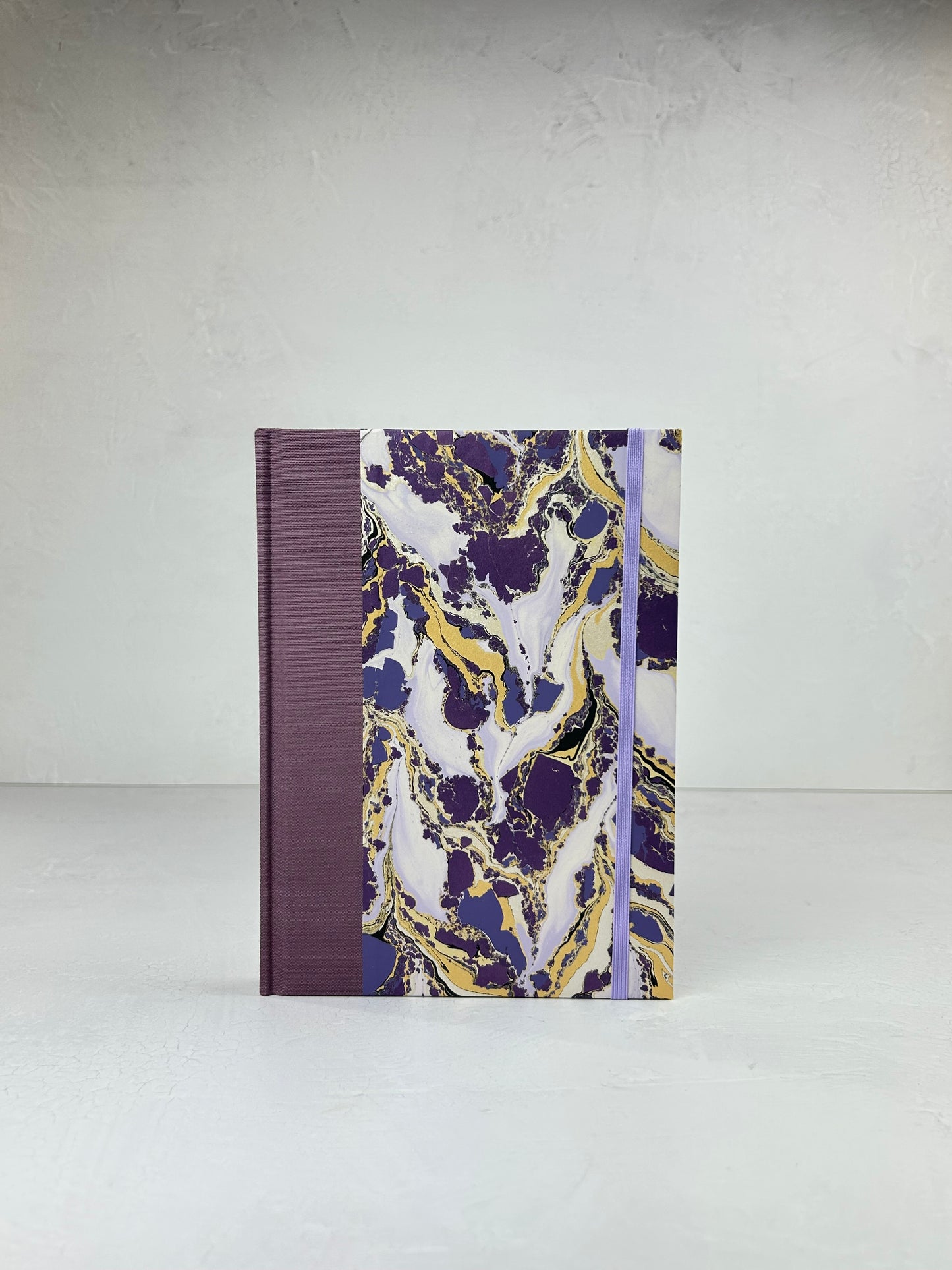 A5 160-page Hardcover Journal finished in plum Japanese book cloth and hand marbled paper by Renato Crepaldi