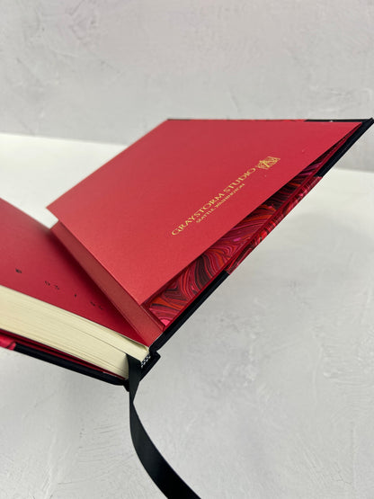 B5 192-page Hardcover Journal finished in Black Japanese book cloth and red hand marbled paper by Daniel Gaál