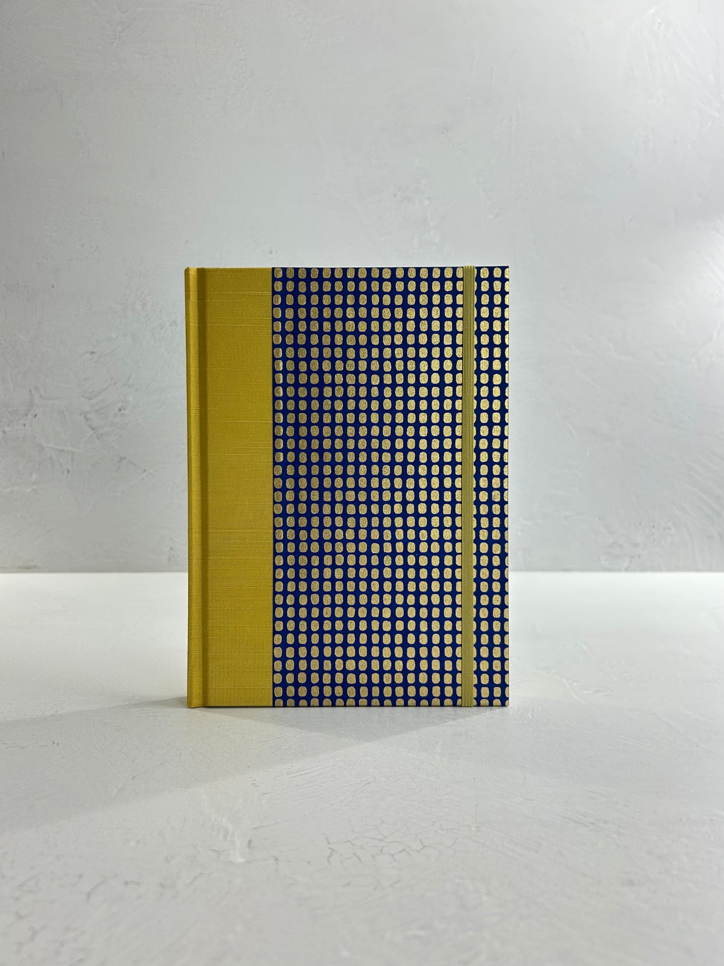 A5 160-page Hardcover Journal finished in Yellow Gold Japanese book cloth and blue and gold Chiyogami Paper