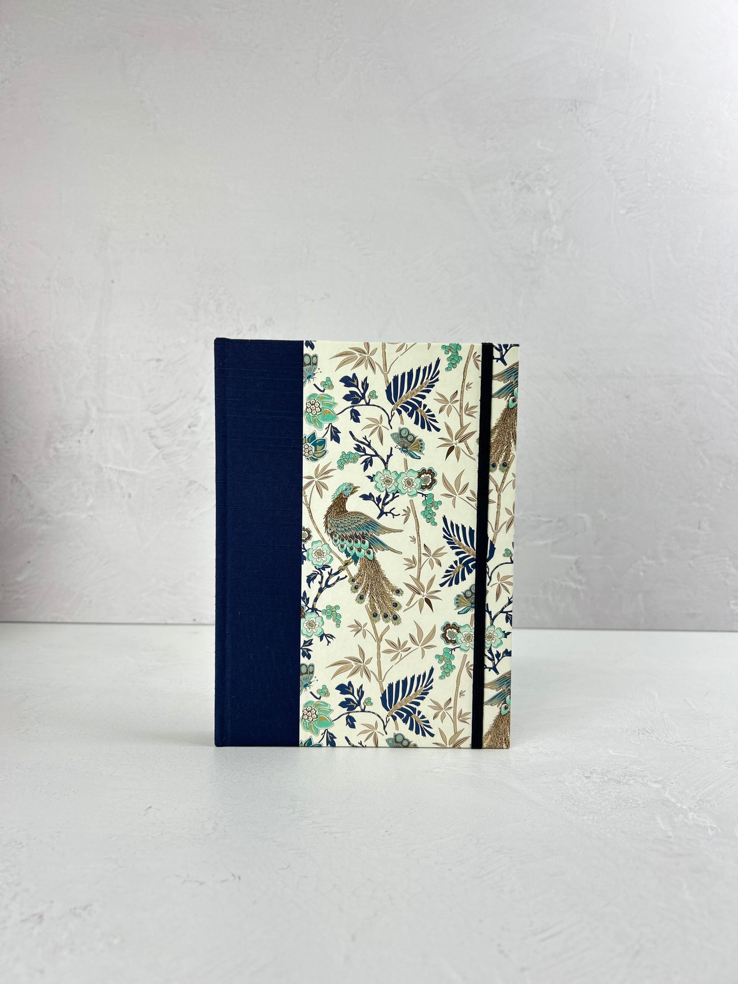 A5 Hardcover Notebook finished in Cadette Blue Japanese book cloth and Gold Peacock Italian Print