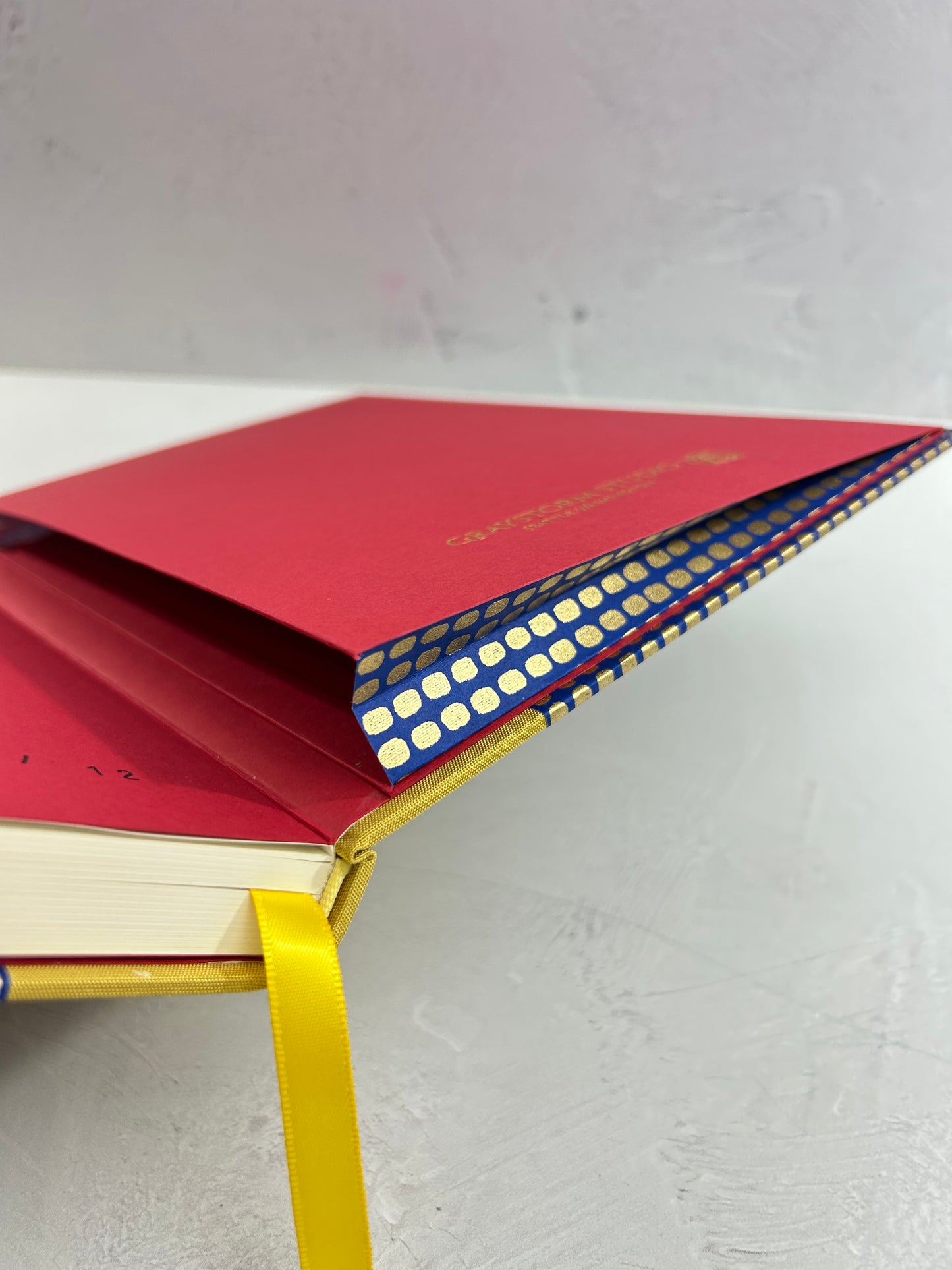 A5 160-page Hardcover Journal finished in Yellow Gold Japanese book cloth and blue and gold Chiyogami Paper