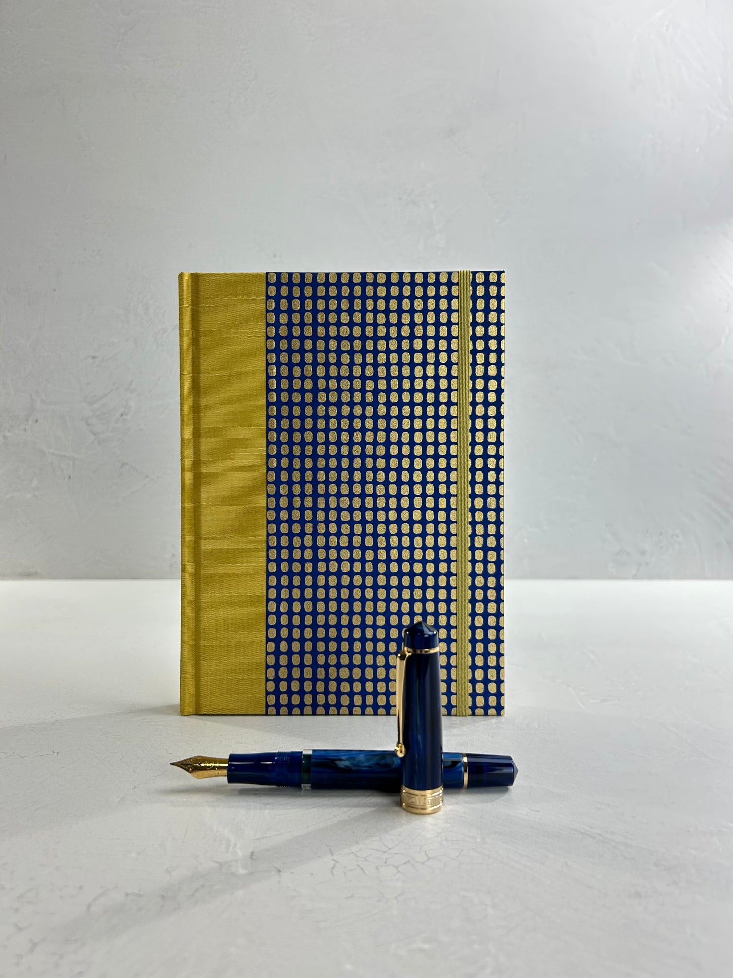 A5 160-page Hardcover Journal finished in Yellow Gold Japanese book cloth and blue and gold Chiyogami Paper