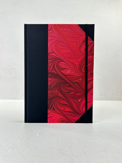 B5 192-page Hardcover Journal finished in Black Japanese book cloth and red hand marbled paper by Daniel Gaál