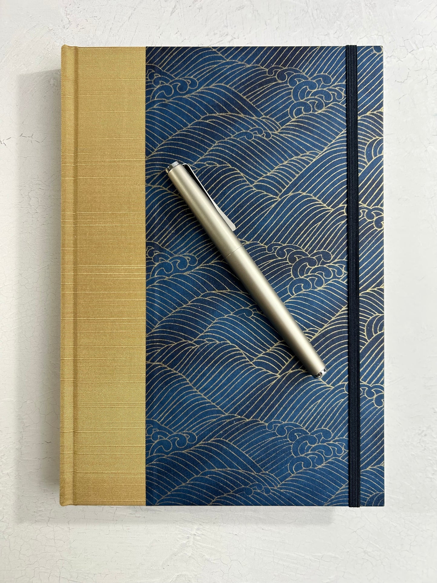 B5 192-page Hardcover Journal finished in soft gold Japanese book cloth and golden waves on blue Chiyogami Paper