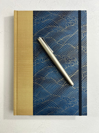 B5 192-page Hardcover Journal finished in soft gold Japanese book cloth and golden waves on blue Chiyogami Paper