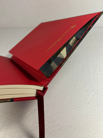A5 160-page Hardcover Hardcover Notebook finished in Cardinal Red Japanese Bookcloth and Black and Gold Chiyogami Japanese Paper