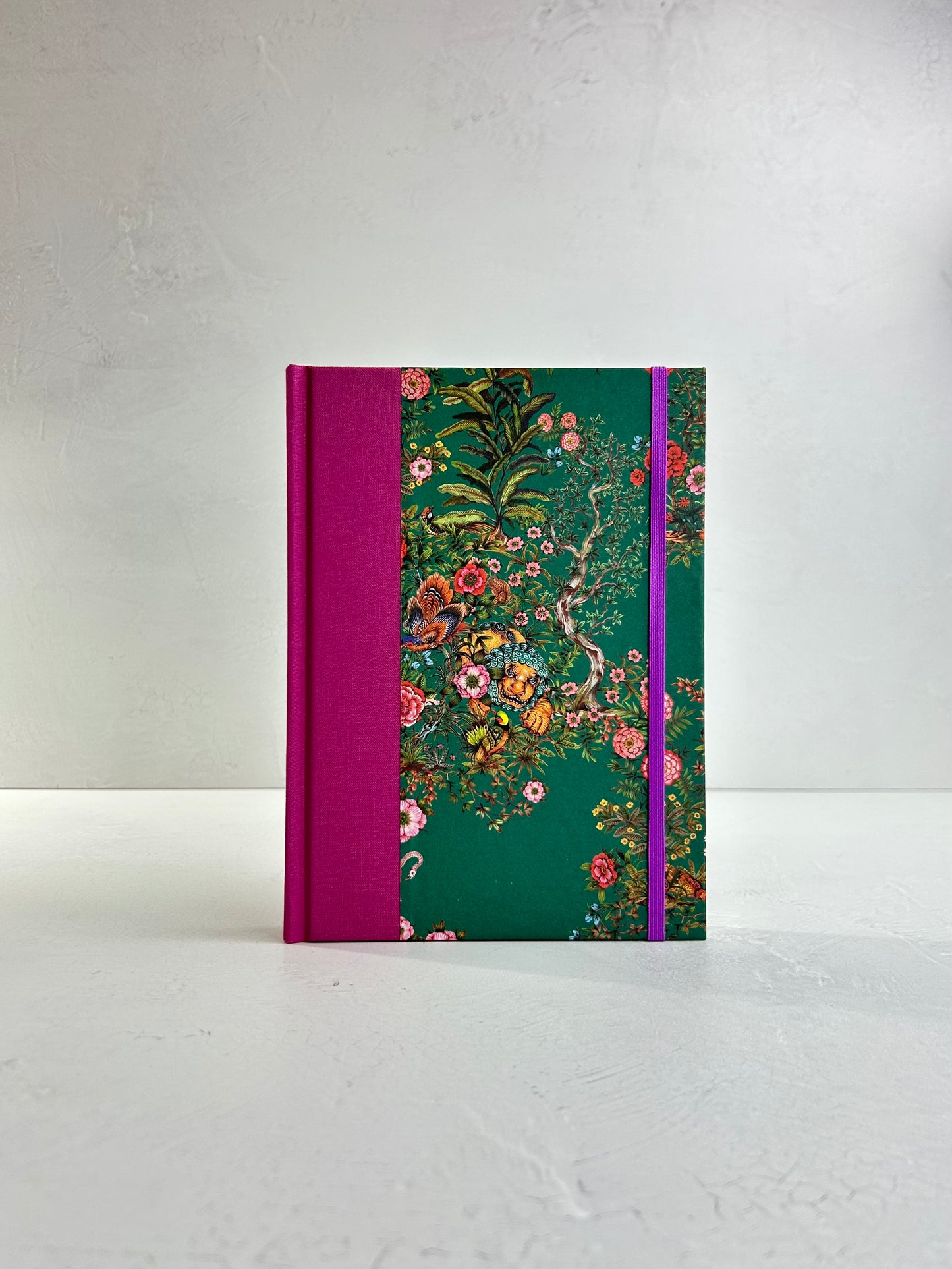 A5 160-page Hardcover Journal finished in in Berry Bloom Verona book cloth and Oasis Print by Phannapast Taychamaythakool