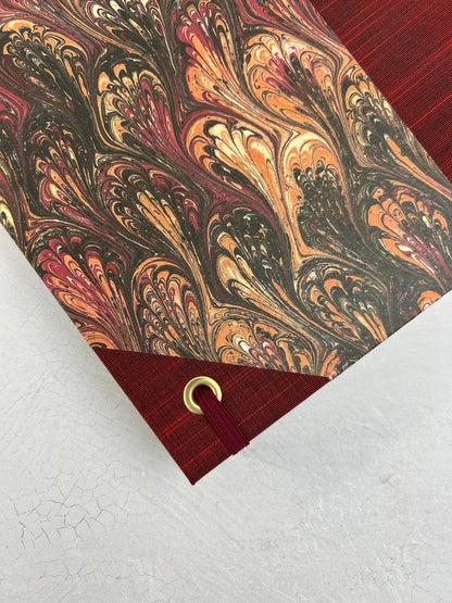 B5 192-page Hardcover Journal finished in Maroon Japanese book cloth and wine/black French Marbled Paper