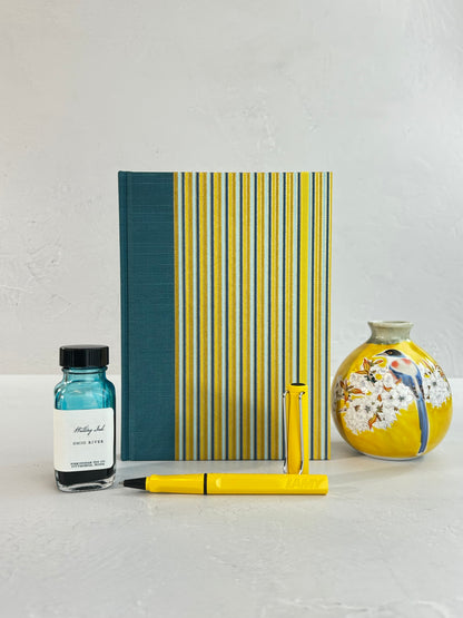 A5 160-page Hardcover Journal finished in Marine Blue Japanese book cloth and pinstripe Chiyogami Paper