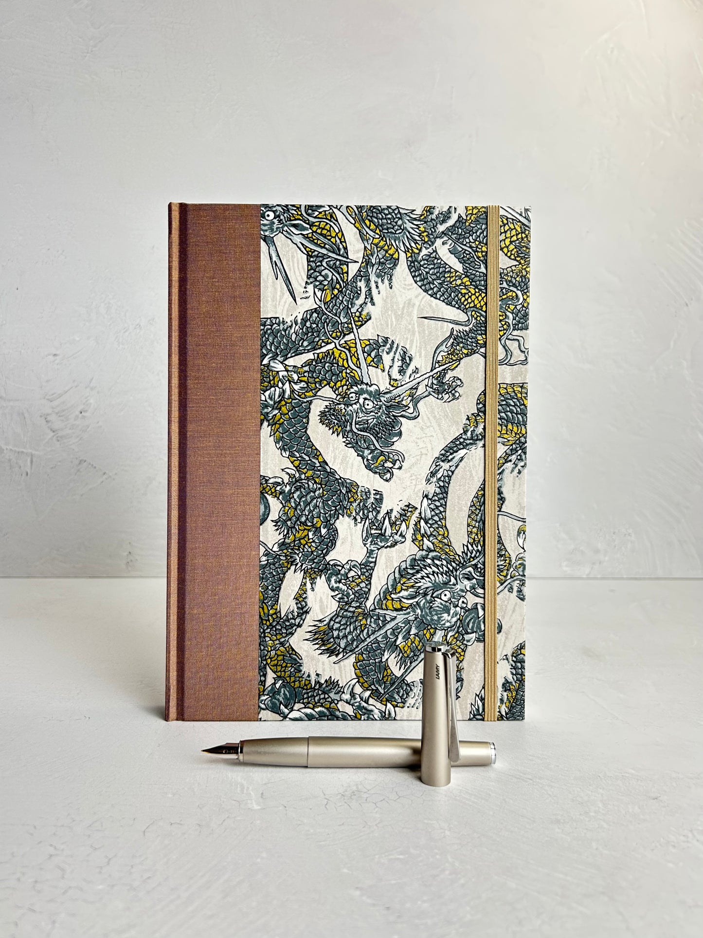 WABI-SABI B5 192-page Hardcover Journal finished in Bronze Japanese book cloth and Dragon Chiyogami Paper
